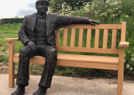 Arthur the bronze sculpture on our garden bench