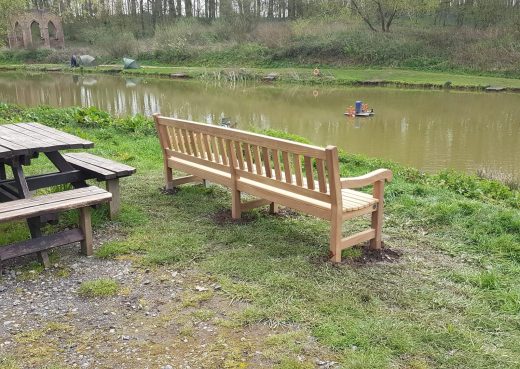 Mendip memorial bench by the lakeside at Risby