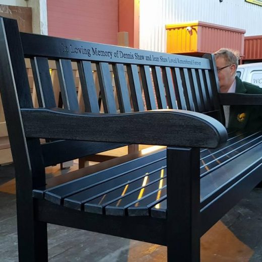 Mike, loading a set of black York benches ready for dispatch