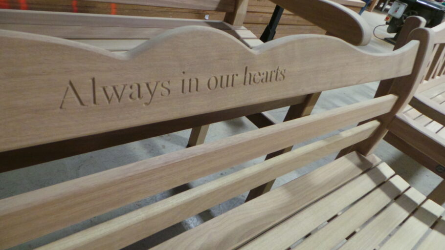 "Always in our Hearts" reads the inscription on the back rest of this bench.